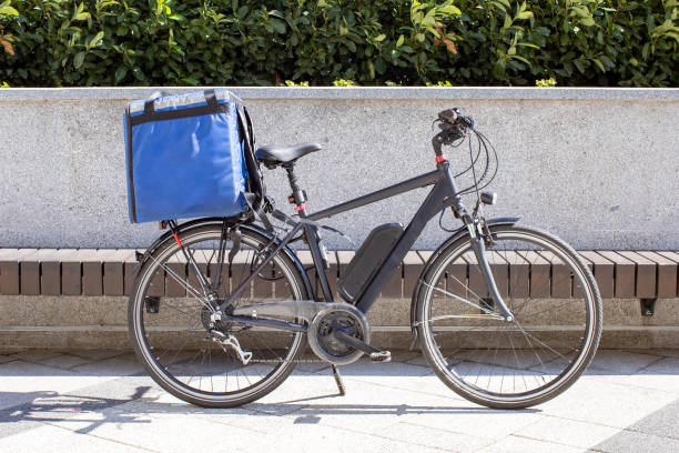 istock electric bicycle for delivery parked outdoors 1355903747
