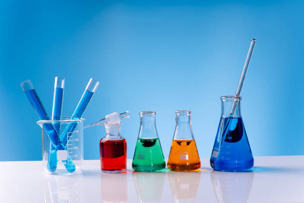 istock Chemical experiment. Laboratory glassware.Human Biology and pharmaceutical technology on laboratory background. 1355910001