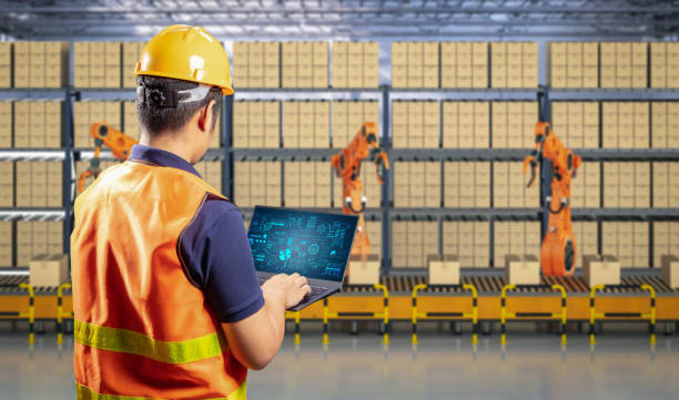 istock Technician control automation robot in factory 1355911104