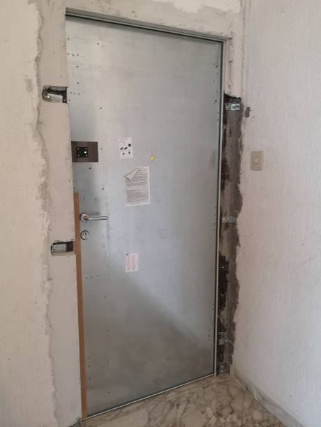 istock installation of the security door 1355914178