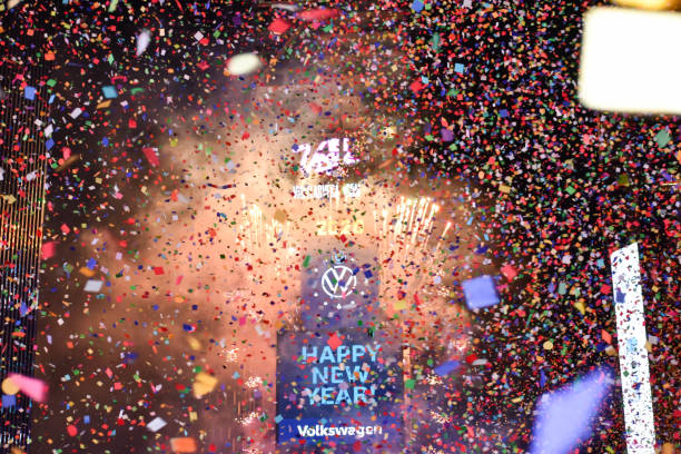 New Year Eve Confetti flying during the New Year Ball Drop event at Times Square in New York City during the new year eve on January 1, 2020. times square new years eve stock pictures, royalty-free photos & images