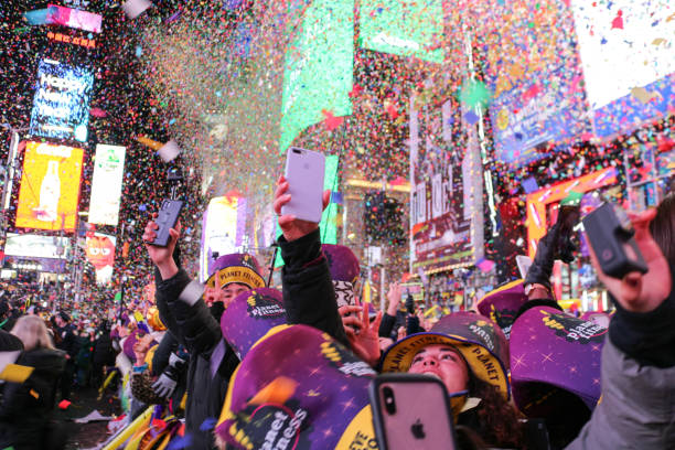 New Year Eve Confetti flying during the New Year Ball Drop event at Times Square in New York City during the new year eve on January 1, 2020. new years eve new york stock pictures, royalty-free photos & images