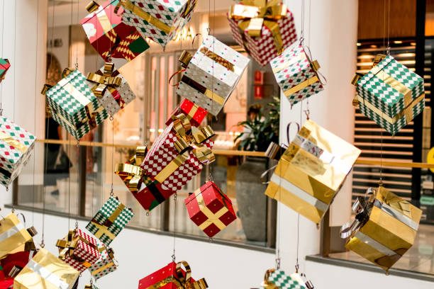 christmas decoration at shopping centre. festive season. holiday shopping. christmas presents gifts - christmas shopping imagens e fotografias de stock