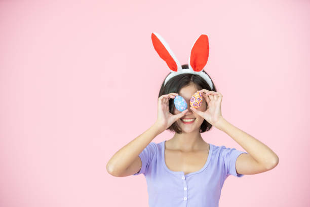 istock Asian girl in easter egg festival. 1355922893