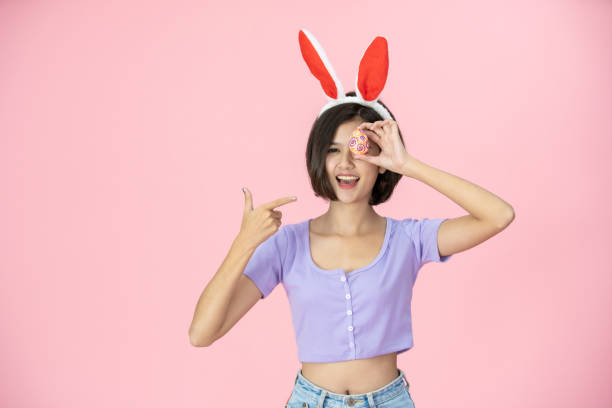istock Asian girl in easter egg festival. 1355923515