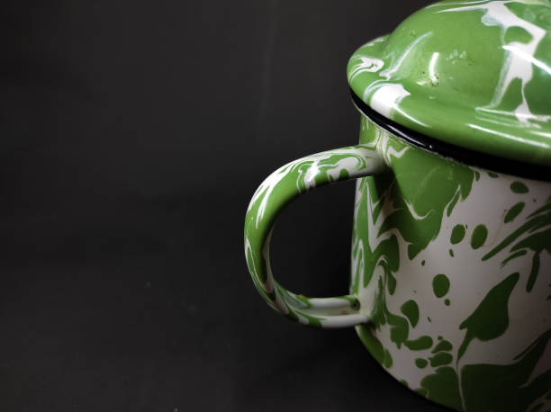 istock large green cups on black - stock photo 1355927145