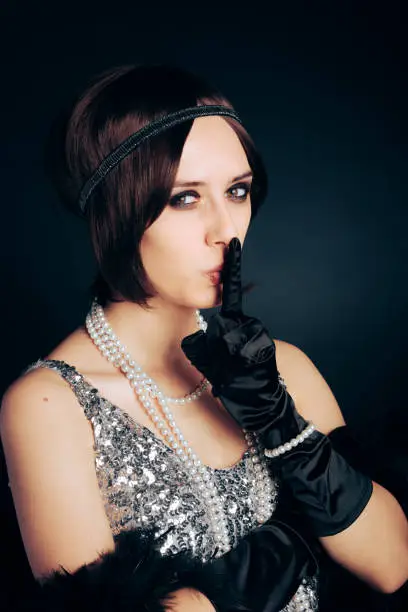 Glamourous retro woman organizing a surprise roaring twenties style celebration