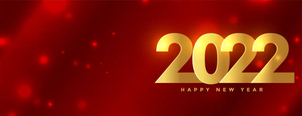 istock premium 2022 happy new year golden text on red shiny background 1355938981