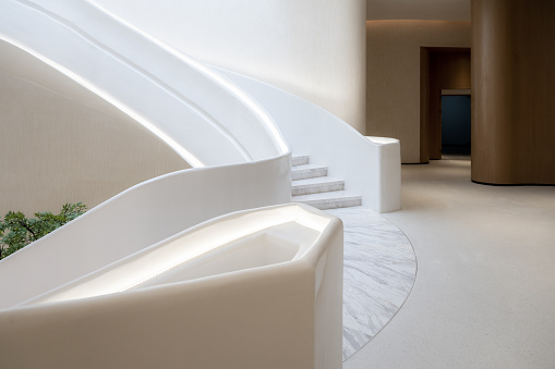 Modern architecture business building, staircase and windows, white walls