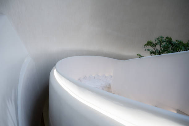 istock Spacious, clean and bright indoor spiral staircase 1355940444