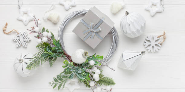 istock Christmas gift boxes on white background. Xmas concept, preparation for winter holidays, boxing day. Festive mock up. Top view. Flat lay 1355941109