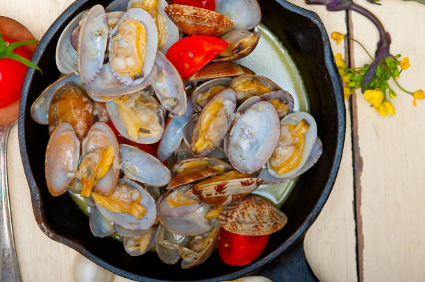 istock fresh clams on an iron skillet 1355947711