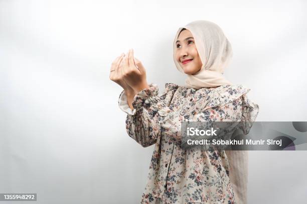 Beautiful Asian Young Muslim Woman Praying Apologizing Sad Feeling Guilty Asking Forgiveness Fasting Ramadan Islam Eid Al Fitr And Eid Adha Isolated On White Background Stock Photo - Download Image Now