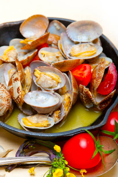 istock fresh clams on an iron skillet 1355948358