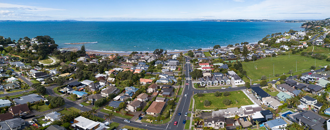 Aerial panoramic view of Red Beach in Auckland, New Zealand