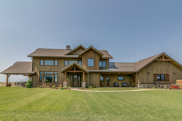 istock Exquisite custom home with natural wood siding 1355952649