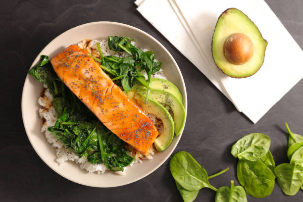 istock roasted salmon fillet with rice and spinach 1355953870