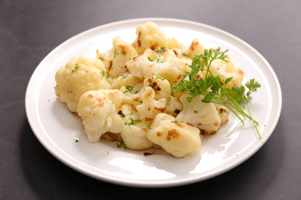 istock grilled cauliflower and parsley in plate 1355953878