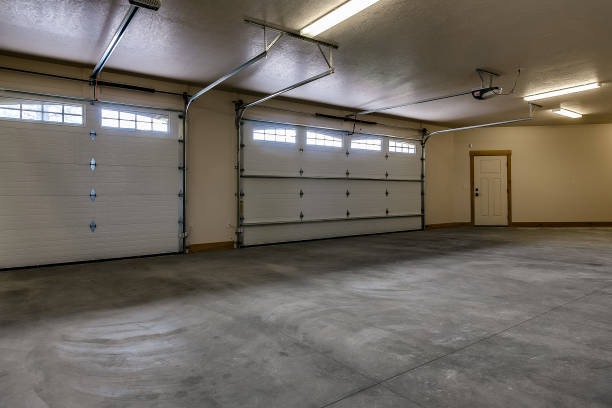 istock Three car garage of new home 1355956235