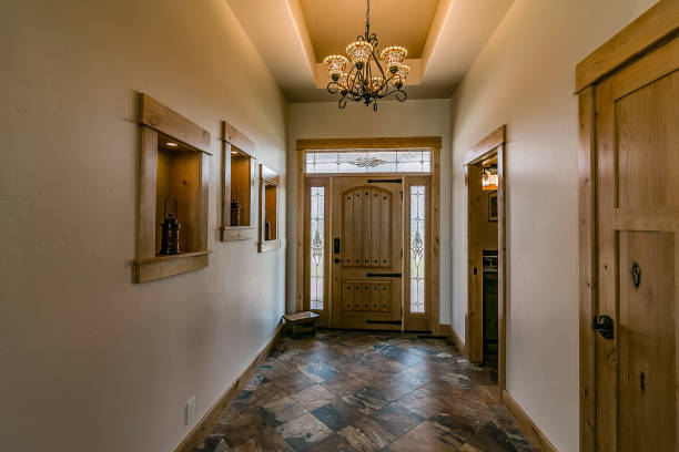 istock Front entrance hallway with lovely chandelier 1355956397