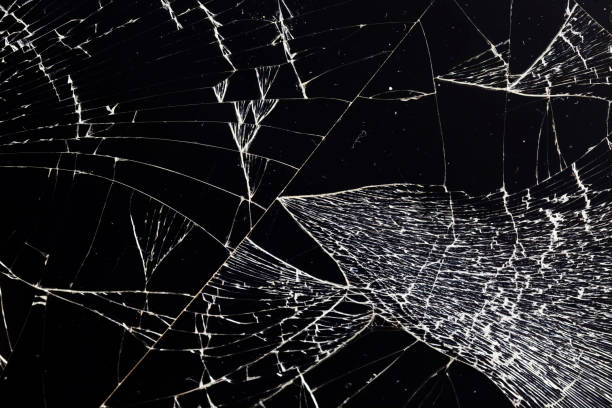 istock broken thin glass with lots of cracks 1355957685