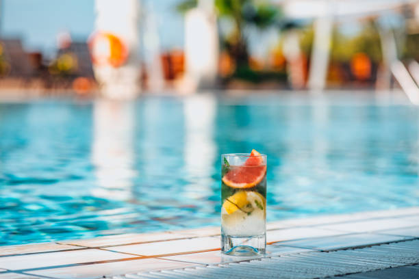 istock Delicious  Mojito Cocktail by the Pool 1355961829
