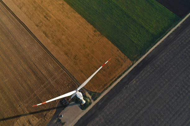 istock Aerial view on modern wind turbine. Alternative energy source 1355961949