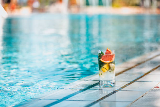 istock Delicious Cocktail by the Pool 1355961990