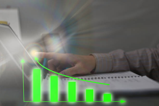 istock hand use computer for graph business growth and analysis financial chart for investment set strategy 1355962877