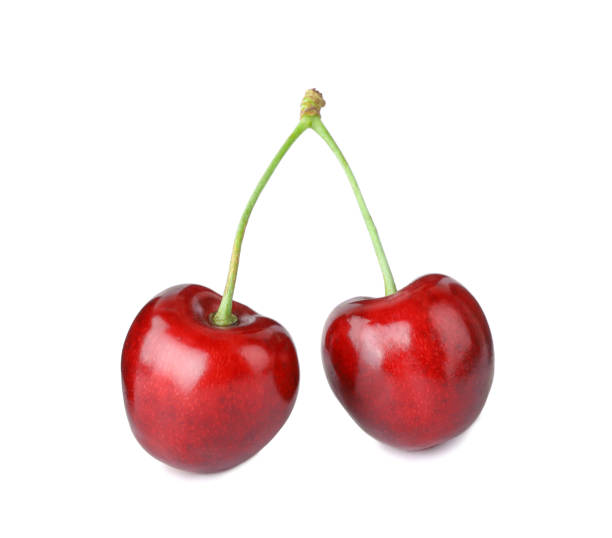 istock Delicious fresh ripe cherries isolated on white 1355963431