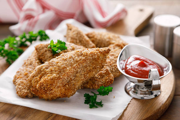 istock Chicken nuggets baked in breadcrumbs 1355970566