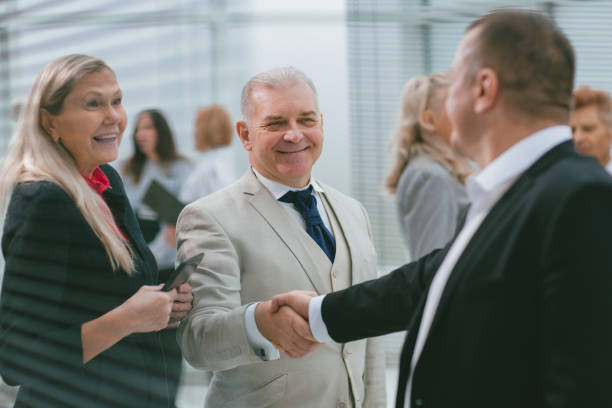 istock successful business partners shaking hands. business concept 1355970586