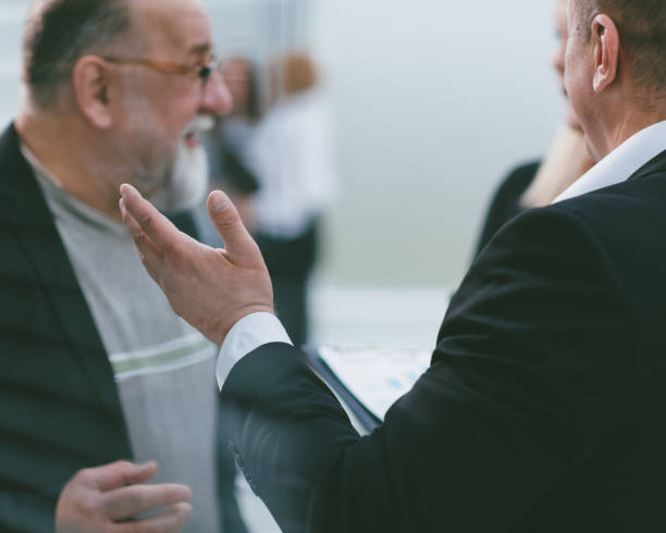 istock close up . business colleagues discussing financial schedules 1355970621