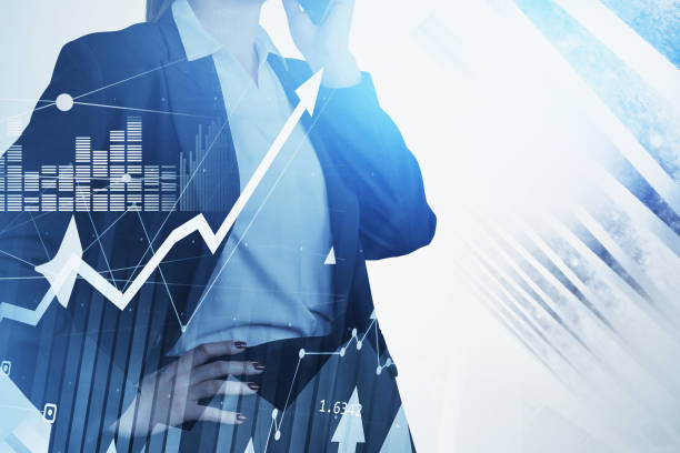istock Businesswoman is standing in hand on hip pose and talking 1355971880