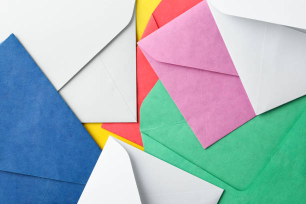 istock Colorful paper envelopes as background, top view 1355971939