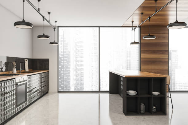 istock Stylish white and black panoramic kitchen with wood details 1355973791