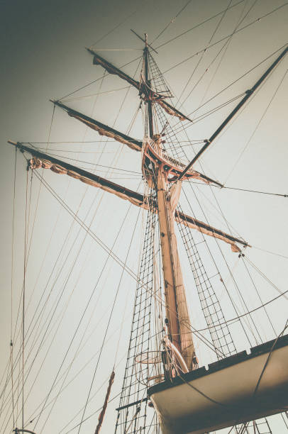 istock White boat is ready to be launched from sailboat. 1355974946