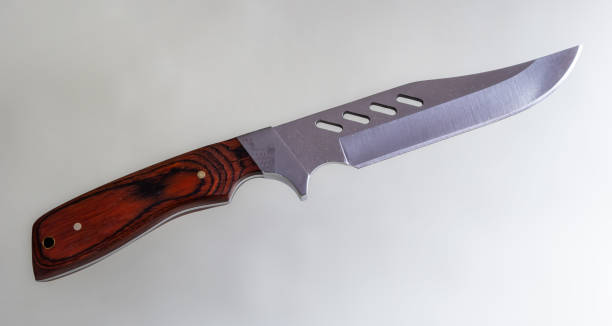 istock close up of a knife on white background with clipping path 1355976169