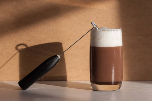 istock Milk foam maker. Mini blender, frothers for coffee, latte 1355981720