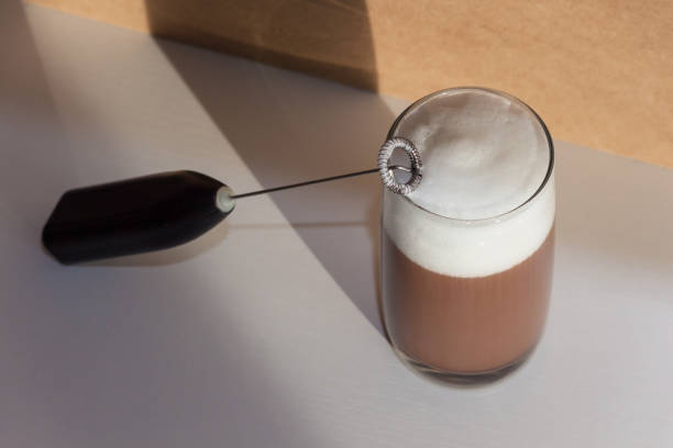 istock Milk foam maker. Mini blender, frothers for coffee, latte 1355981721