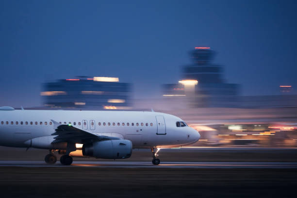 Airplane during take off on airport runway"n stock photo