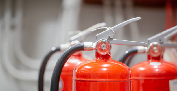 istock The red fire extinguisher is in the building for fire prevention and safety. 1355985085