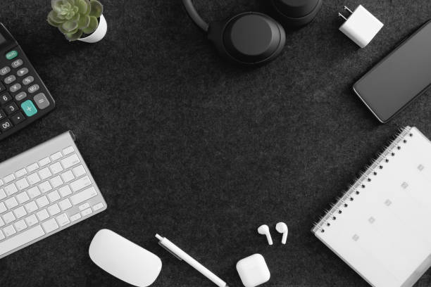 istock top view of home desk table with notebook, plastic plant and keyboard 1355990466