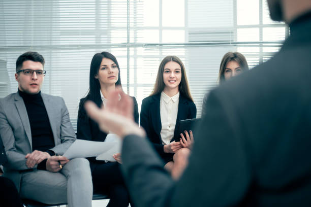 istock project Manager at a meeting with the working group 1355993306