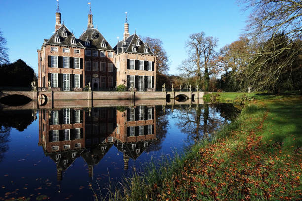 Netherlands. Voorschoten. November 22, 2021. \nReflections of the Castle Duivenvoorde in the country estate of  Voorschoten