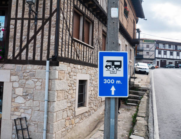 Motorhome stopover area road sign La Alberca, Spain - November 21, 2021: Motorhome stopover area road sign in the La Alberca, Castile and Leon, Spain. stopover stock pictures, royalty-free photos & images