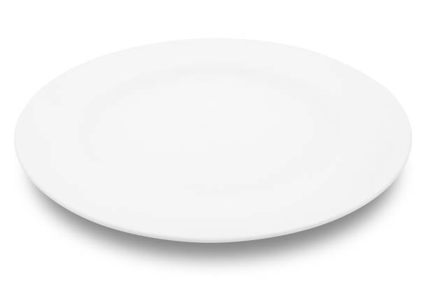 istock White circle ceramics plate isolated on white background. 1356003266