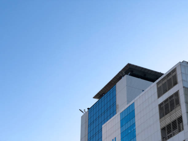 istock Rooftop of a building against the blue sky 1356005240