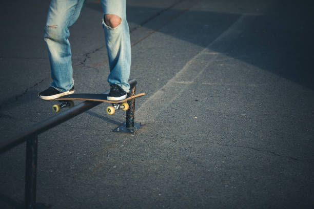 istock Skateboarder riding fast towards the ramps 1356007555
