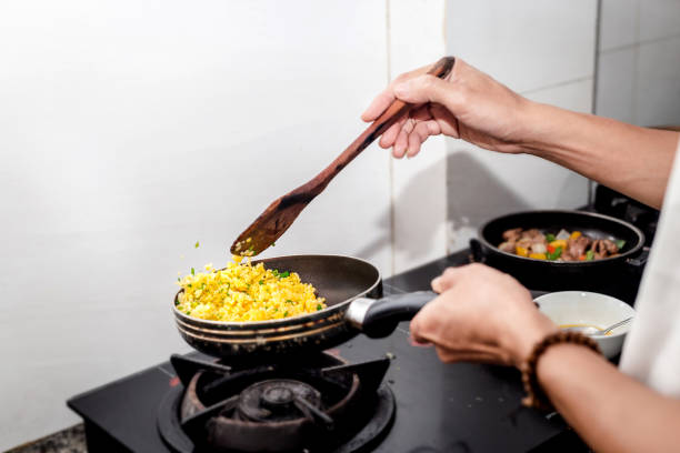 istock Cooking Asian Fried Rice At Home 1356007634